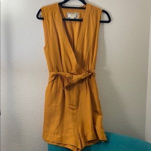 Romper, brand new . Took the tag off. Never worn.